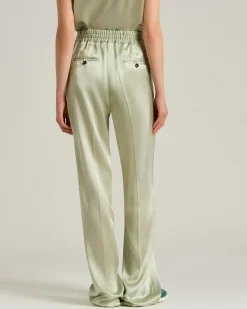FLUID SATIN TROUSERS IN GREEN SILK