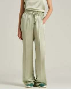 FLUID SATIN TROUSERS IN GREEN SILK