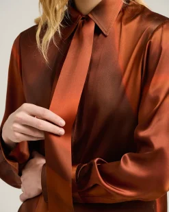 RUST-COLORED PRINTED SILK BLOUSE WITH TIE NECK