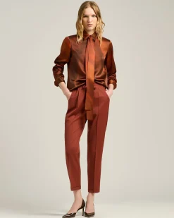 RUST-COLORED PRINTED SILK BLOUSE WITH TIE NECK