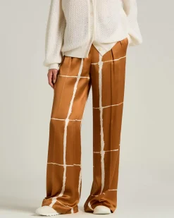 SILK SATIN TROUSERS WITH ABSTRACT PRINT IN LEATHER