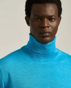 SKY BLUE SILK AND “DIAMANTE BLU” WOOL TURTLENECK