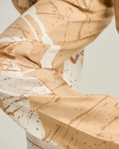 WIDE LEG TROUSERS WITH ABSTRACT PATTERN IN CAMEL SILK